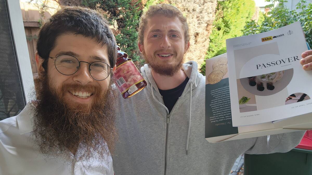 Rabbi Menachem Aron and Rabbi Aaron Moshel distribute Passover supplies around Australia. Picture supplied