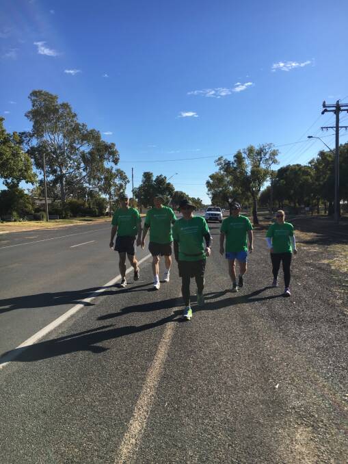 Bill and his support network and Narromine crew walking out of Narromine last Monday. 