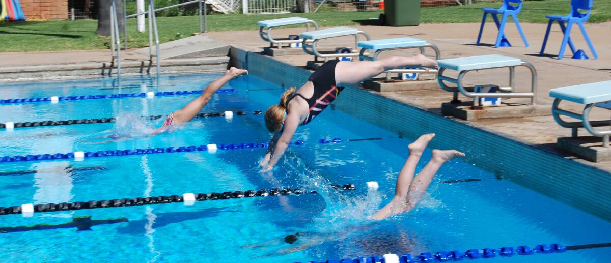 DIVING IN: The Narromine pool on Burraway Street is a popular place. The Narromine Run For A Cover is hoping to raise money to enhance the pool. Photo: FILE. 