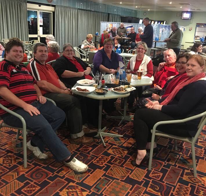 READY IN RED: Michael, Peter and Annette Treseder, Sandra Monoghan, Louise Harding, Wendy Coleman, Jo Foutain and Caitlin Groth.