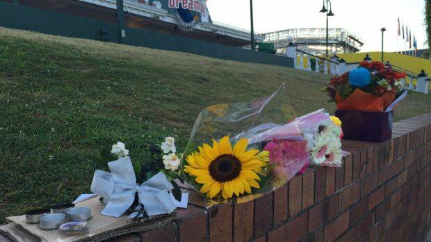 Flowers left in tribute for the four people killed at Dreamworld. Photo: Rachel Olding
