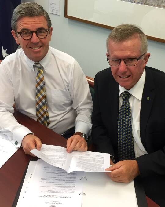 SAFE AND SECURE: Assistant Minister for Health Dr David Gillespie, pictured with federal Member for Parkes Mark Coulton, has announced funding for training to help nurses and health professionals working in remote communities improve their personal safety and security. Photo: Contributed.