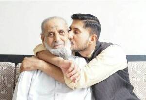 Mohammad Akbar Asabi and his son Zeeshan Akbar, who was stabbed to death in Queanbeyan in April. Photo: Supplied