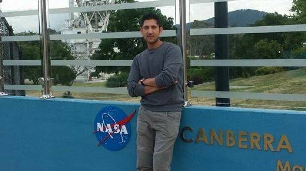 Akbar's father, uncle and best friend visited the Canberra Deep Space Communication Complex to record part of the tribute video they sent to his sick mother in Pakistan. Photo: Supplied