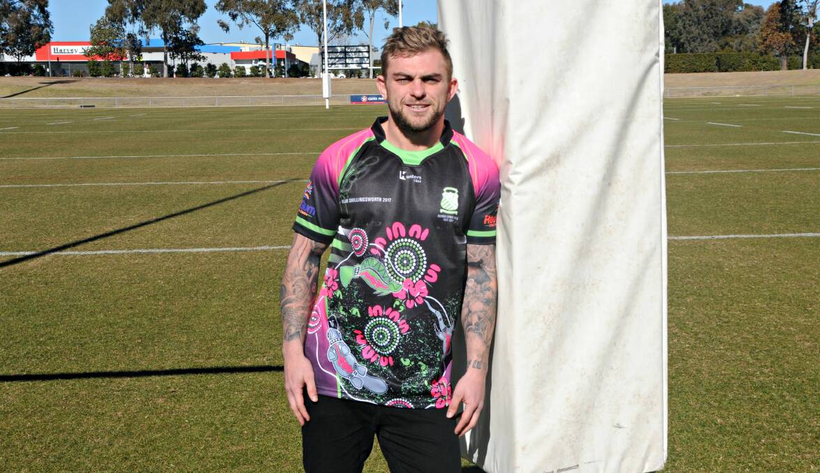 CULTURE: Jyie Chapman and the jersey CYMS will wear for this weekend's indigenous round match. Photo: NICK GUTHRIE