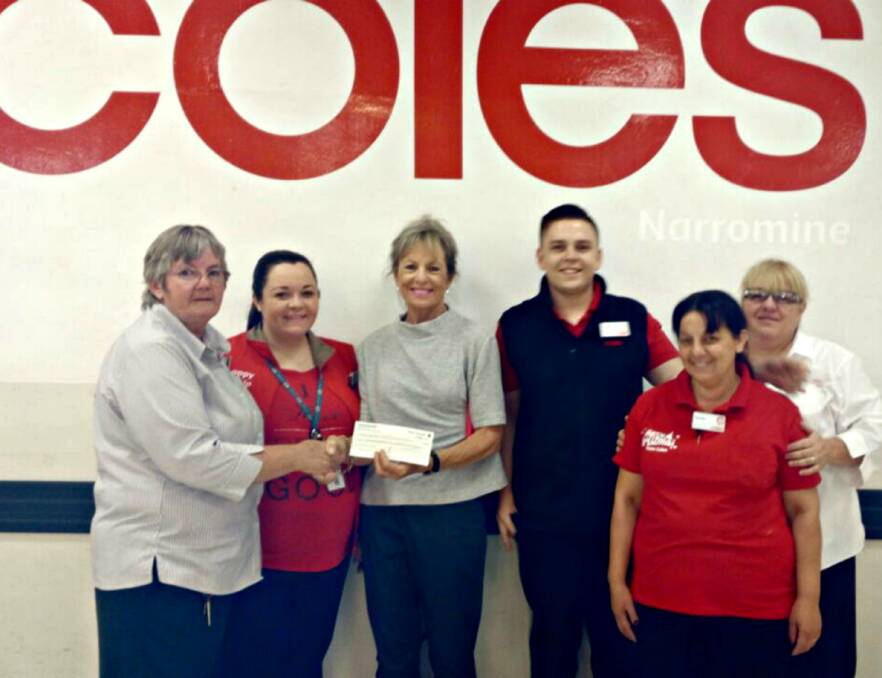 Charity golf day: Betty Green presenting a cheque to Judy Barlow and Casey Siegal, Taylor Humphries, Karen Apap and Toni-Ann Macdonald from Coles.