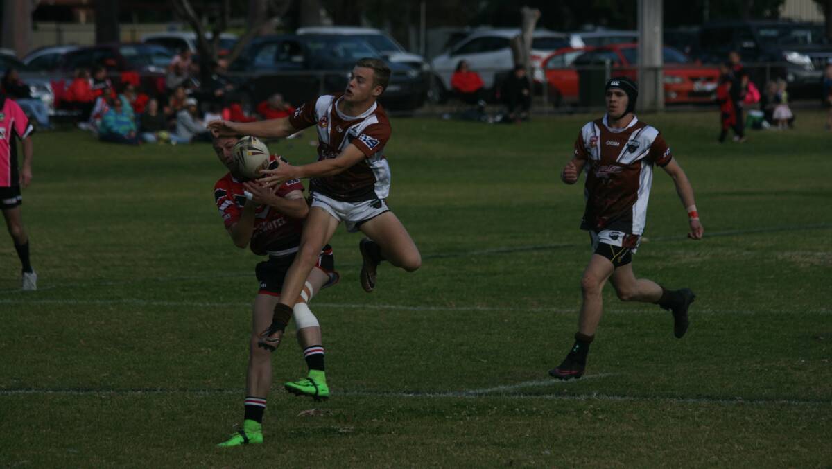 HIGH FLYER: Evan Ryan in action during the round 11 clash between Gilgandra and Coonamble. Photo: STEPHEN BASHAM