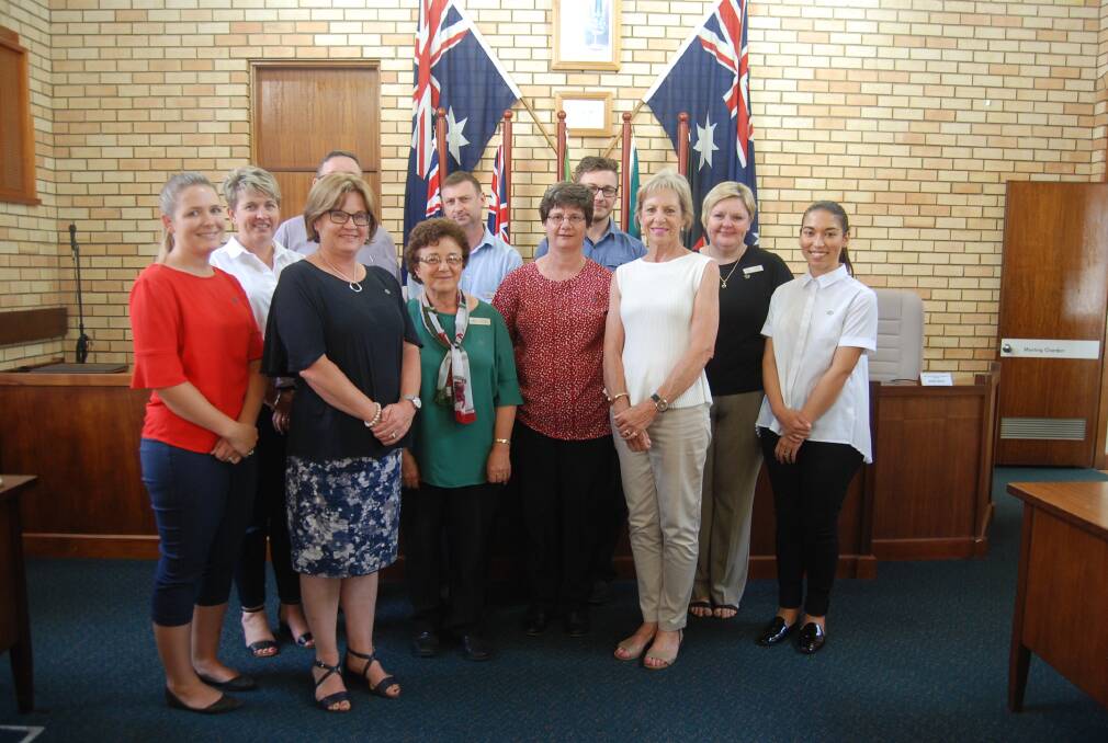 GENEROUS: Council general manager Jane Redden and staff with Judy Barlow. Photo: JENNIFER HOAR