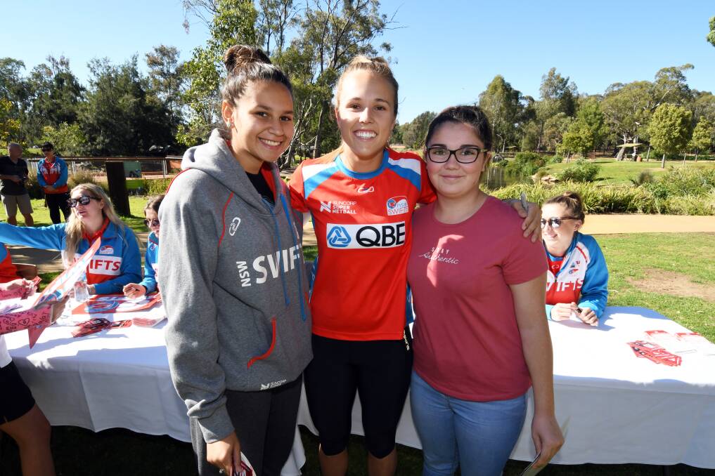 Makahlia (16) and Kira-lyn (14) Edwards with NSW Swifts player Paige Hadley. Photo: BELINDA SOOLE
