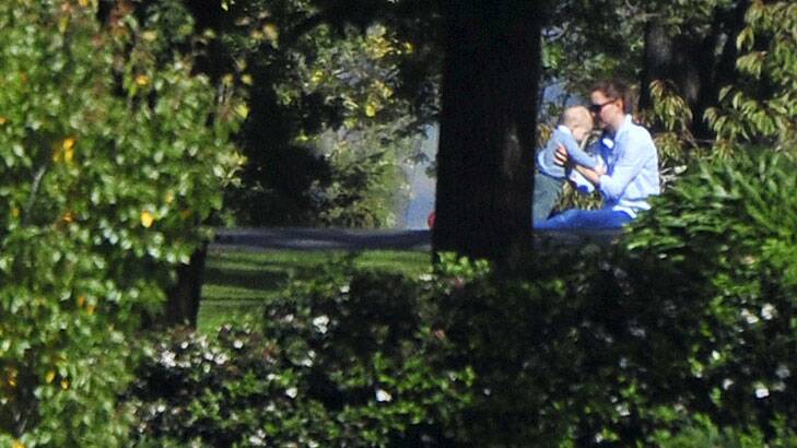 Catherine, Duchess of Cambridge plays with Prince George on the grounds of Government House.