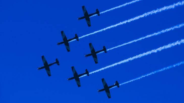 The RAAF Roulettes perform in formation over Canberra as part of ADFA's open day. Photo: Rohan Thomson