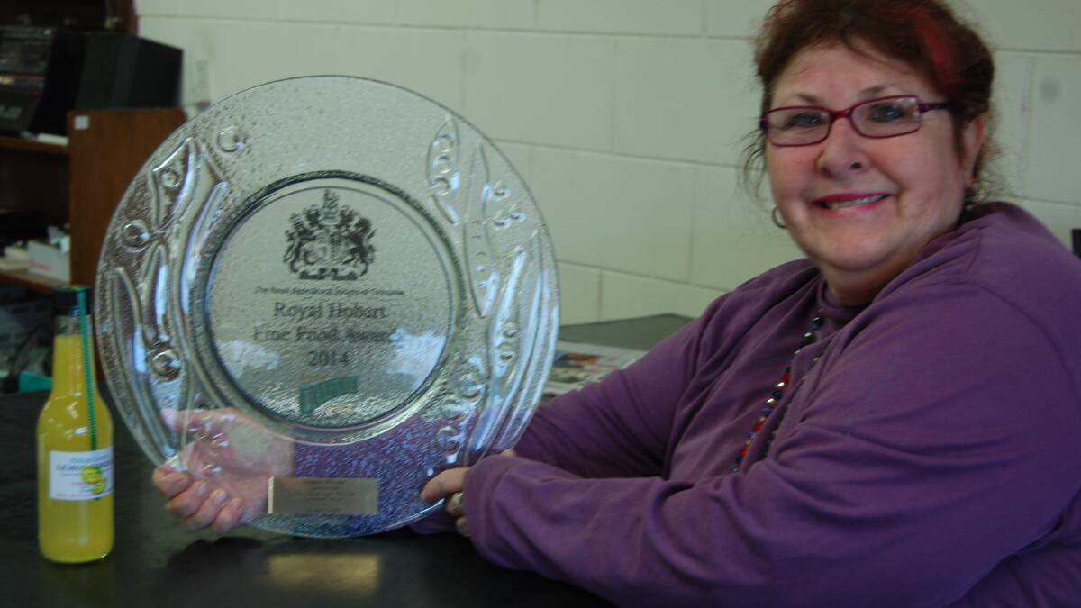Mrs Brydon with her award and the famous cordial.