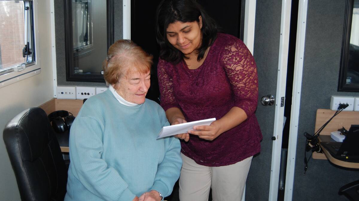 Ms Joseph showing Charmaine Treseder her hearing results.