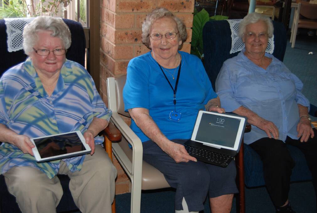 Marion Barling, Dolcie Maidens and Syvia Tankred are thrilled with their new iPads.