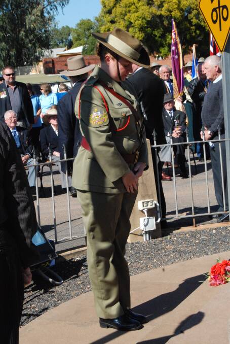 MORNING SERVICE: WO1 Nadia McCulloch laying her wreath