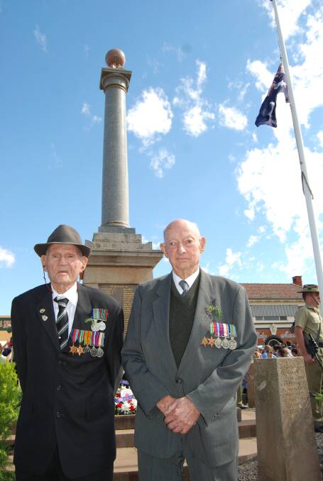 World War II Veterans Frank Smith and Keith Hayden at the Narromine Cenotaph on Saturday.