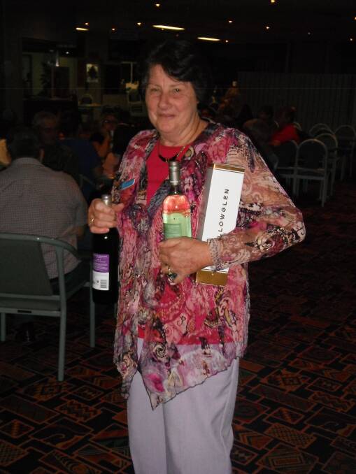 Maureen Jones sneaking away with the second prize in the raffle