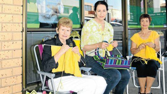 Margaret Evans, Sally Forsstrom and Margaret McDonald are using their knitting skills to protest against CSG. Photo: BELINDA SOOLE