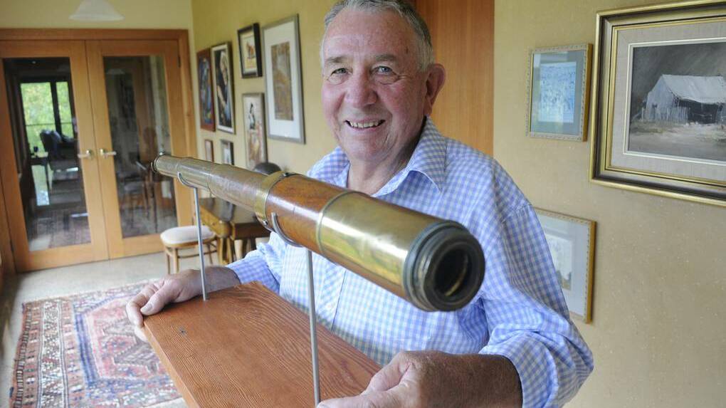 BACK IN BATHURST: Tim Cox with the telescope that belonged to his great-great-great-grandfather Lieutenant William Cox, who built the first road across the Blue Mountains. Photo: CHRIS SEABROOK 