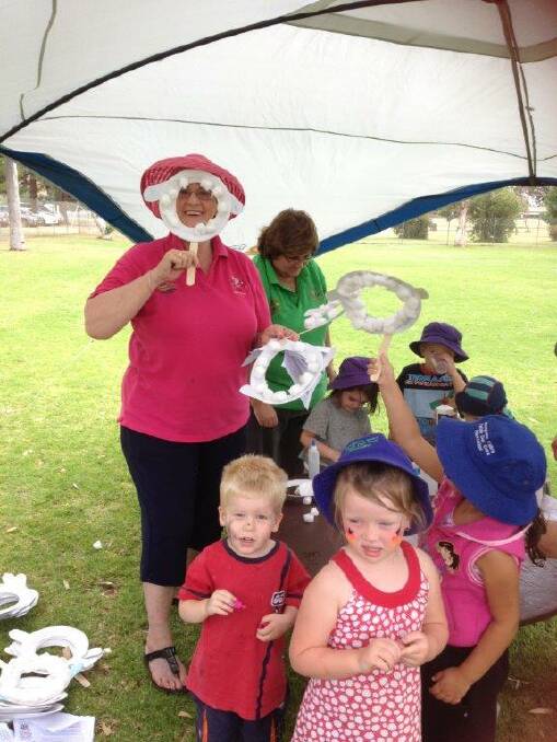 o Joan Walker and some of the children making masks at ‘L’ for lambs.