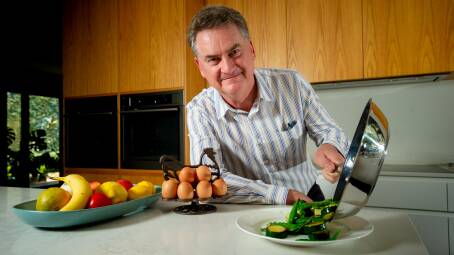 CEO of Dietitians Australia Robert Hunt making the most of his fresh produce. Picture: Elesa Kurtz