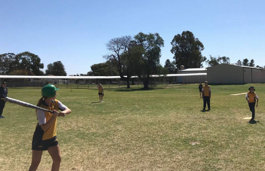 Narromine High: Mr Rafferty's Year 7/8 PDHPE class are honing their softball skills in preparation for a match against Mr McCabe's class on Friday!
