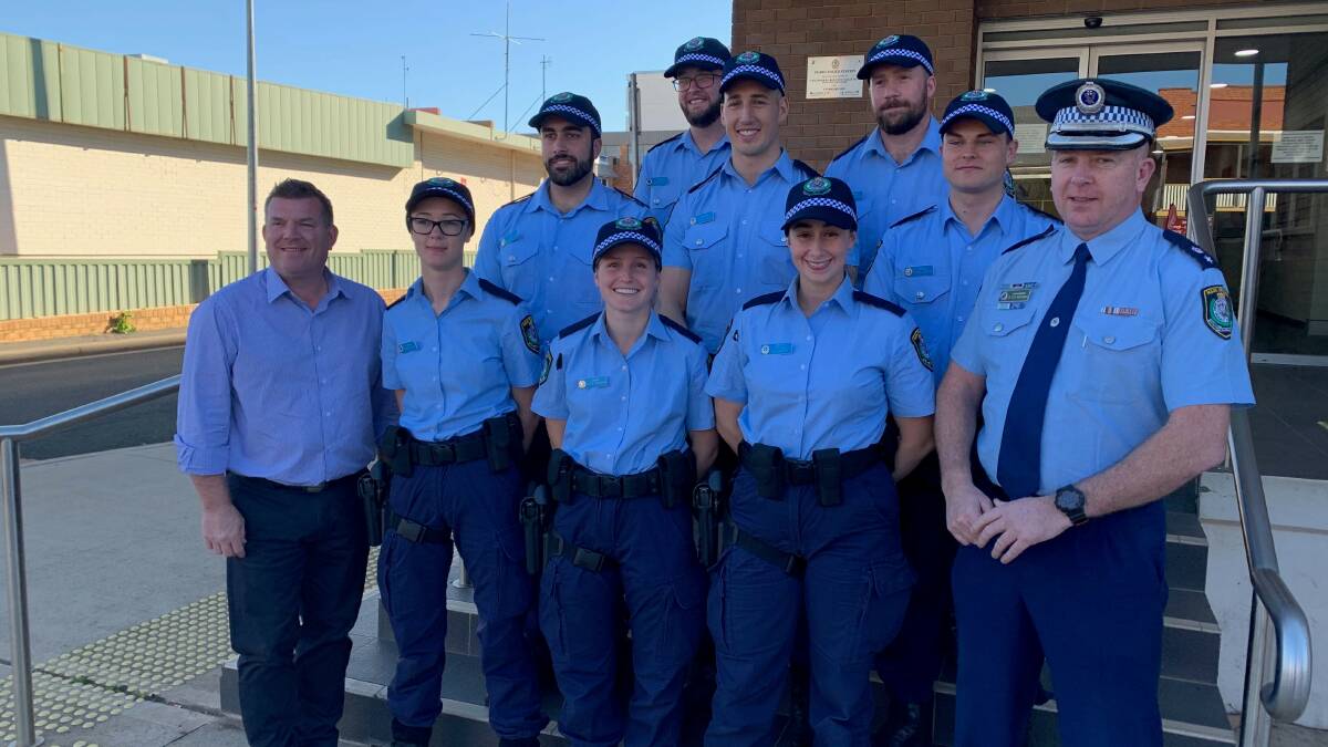 Member for the Dubbo electorate Dugald Saunders with Orana Mid-Western District commander Superintendent Peter McKenna and the eight new recruits.