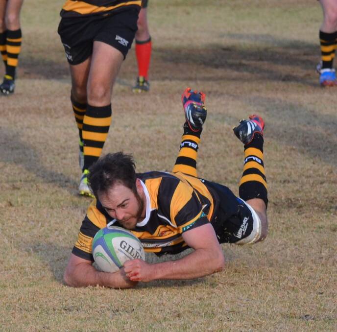 TRY TIME: Brenton Montgomery scored the Tigers second try. Photo: CONTRIBUTED.