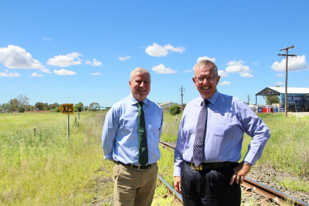 Deputy Prime Minister and Minister for Infrastructure, Transport and Regional Development Michael McCormack and Federal Member for Parkes and Minister for Regional Health, Regional Communications and Local Government Mark Coulton encourage community groups to apply for the next round of the Inland Rail Community Sponsorships and Donations program. Photo: CONTRIBUTED