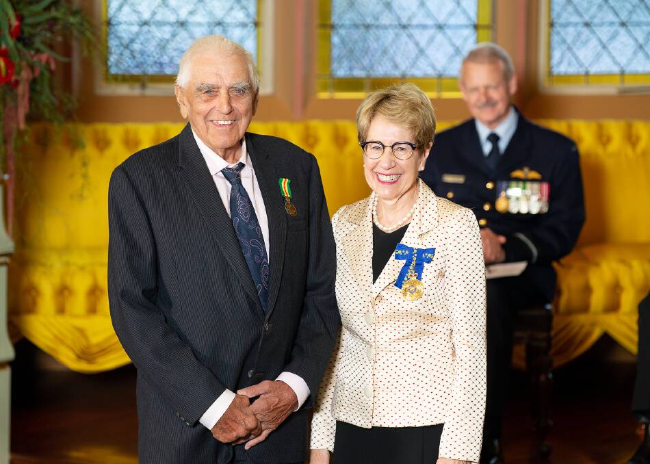 RECOGNISED: Group captain Gordon Heckendorf was presented his Australian Fire Service Medal from the Governor of NSW Margaret Beazley. Photo: ROB TUCKWELL