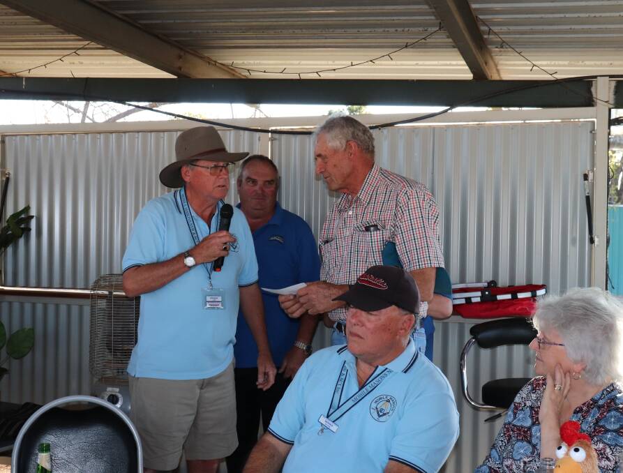 SUPPORT: Mobile Mason NSW & ACT president Graeme Leer presents a cheque to Narromine Shire Cancer Support Group vice president Jeff Anderson. Photo: ZAARKACHA MARLAN