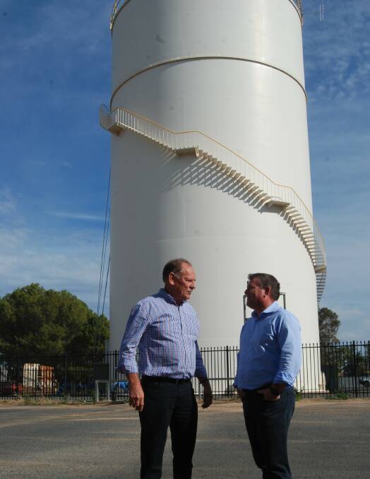 FUTURE SECURITY: Narromine Shire Mayor Craig Davies and Member for Dubbo Dugald Saunders at the Nymagee Street water tower. Photo: ZAARKACHA MARLAN