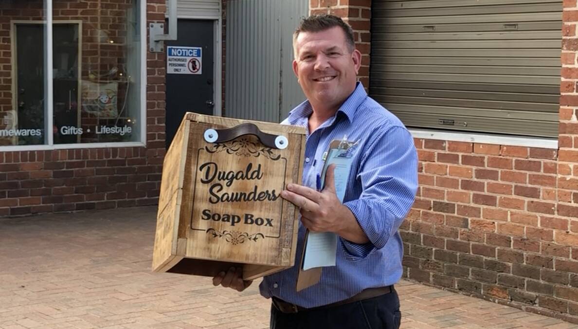 OLD FASHIONED: Nationals candidate for the seat of Dubbo Dugald Saunders did some old fashioned campaining from his soap box in Narromine. Photo: CONTRIBUTED
