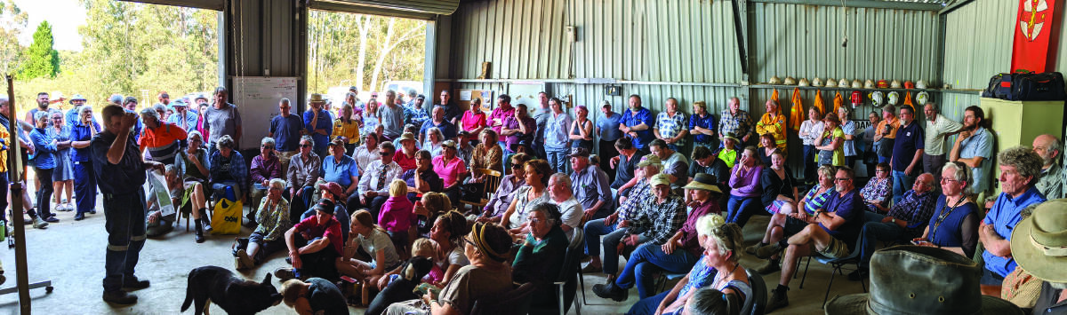 Mongarlowe RFS captain Paul Bott addressing a community meeting at the Mongarlowe fire shed on December 4. Photo: Supplied. 