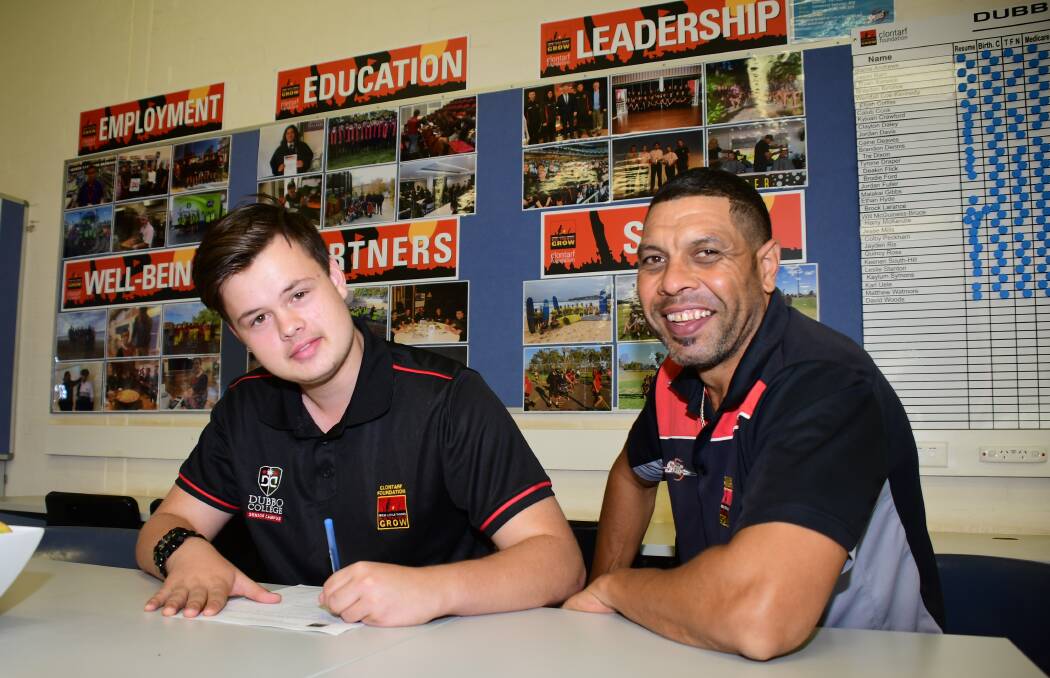 Support: Student Jesse Mills and Clontarf employment officer Bruce Wilson. Photo: Amy McIntyre. 