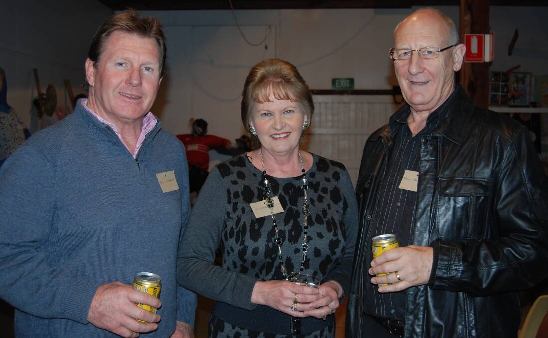 COMMUNITY MINDED: Tony Barlow (right), with wife Colleen (centre) and former mayor of Narromine, Bill McAnally in 2014. Photo: FILE