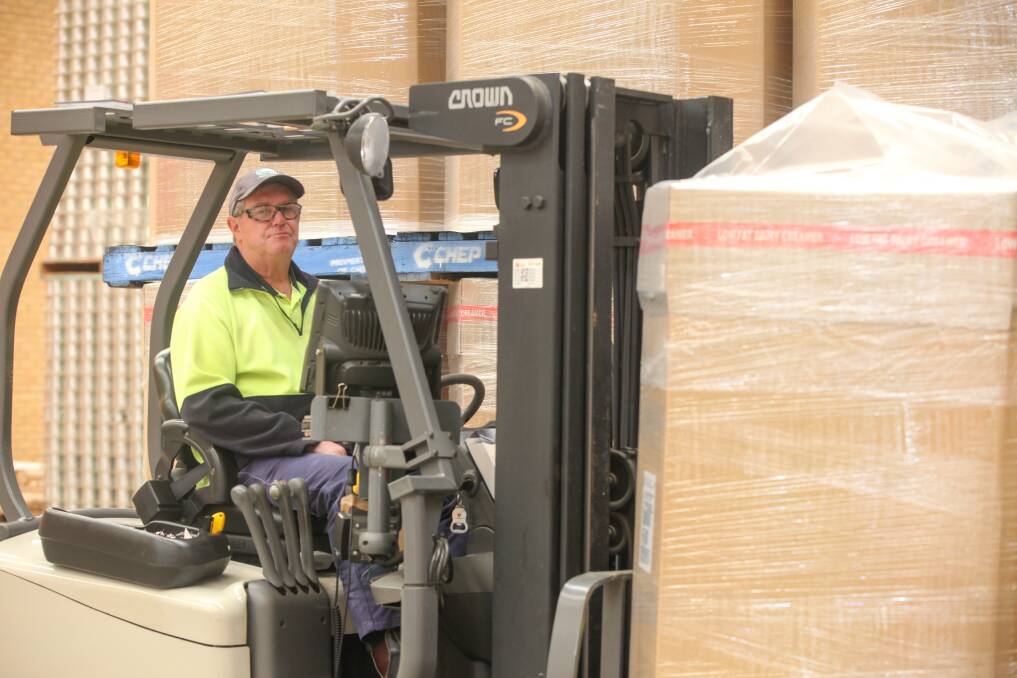 Forklift driver Lawrence Thomas stacks pallets in the warehouse. Picture: Rob Gunstone