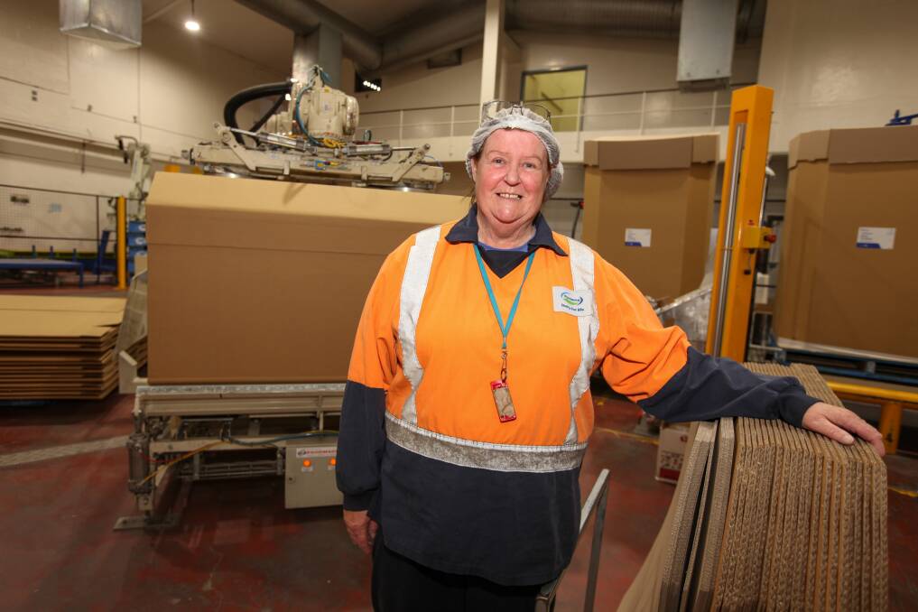 Packing and boxfill operator Shirley Noonan puts together the last containters for milk powder. Picture: Rob Gunstone