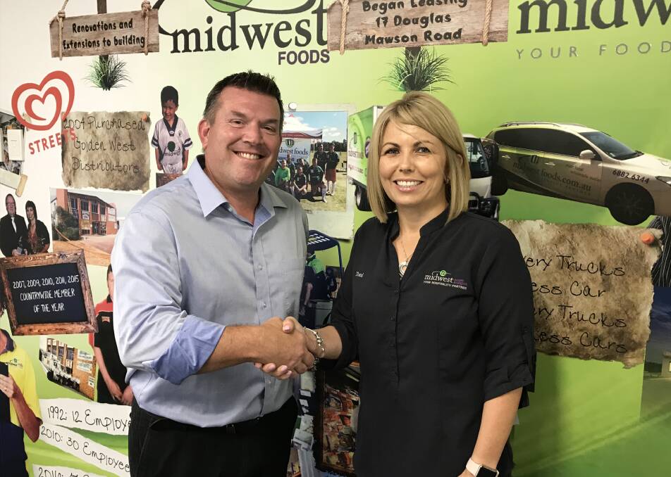 Dugald with Toni Alderdice from Midwest Foods, one of the local businesses that will benefit from changes to payroll tax thresholds.