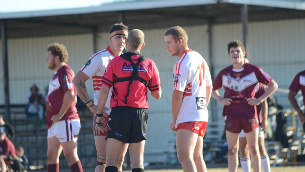 OFF FOR TEN: Whistle-blower Ray O'Brien chats to Narromine captain Corey Cox before sending Dane Cox to the sin bin. Photo: FORBES ADVOCATE