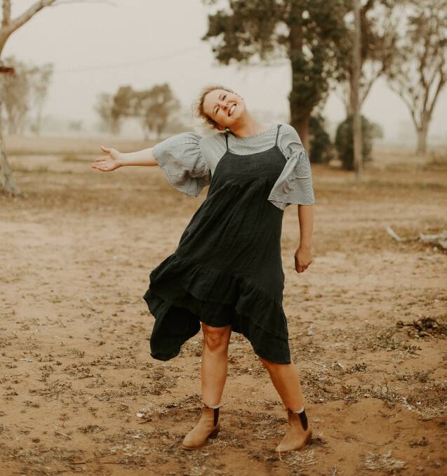 Country spirit: Photographer Georgie Newton during travels to Coonamble when a dust storm struck. Photo contributed.