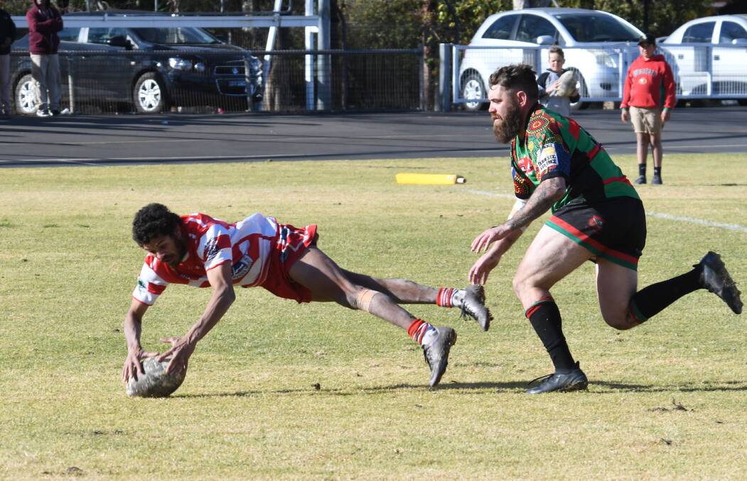 HERE TO PLAY FOOTBALL: The Westside Rabbitohs and Narromine Jets out on a show at Victoria Park No. 1 Oval on Sunday. Photos: AMY MCINTYRE