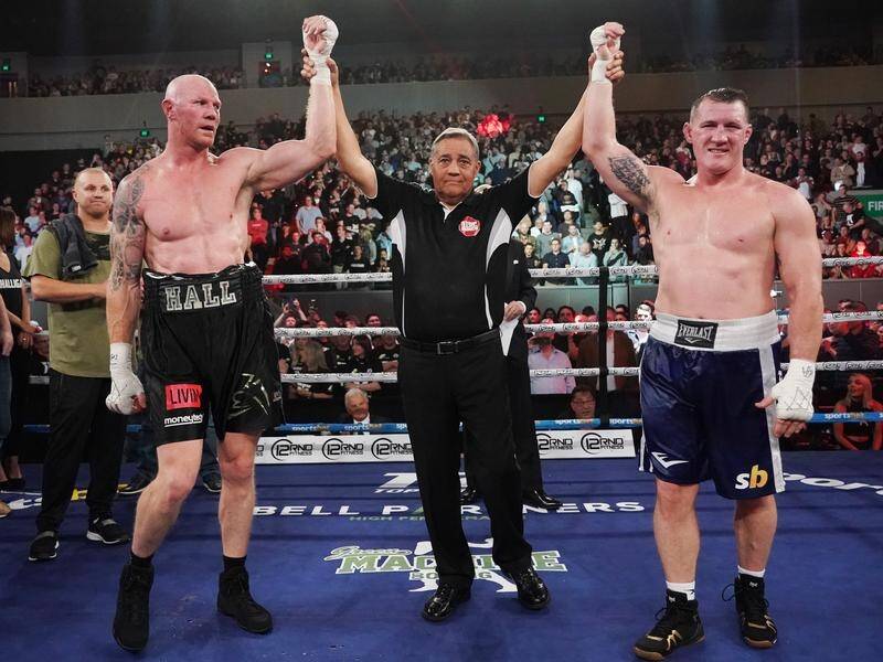 Barry Hall and Paul Gallen's (right) boxing bout in Melbourne has been declared a draw.