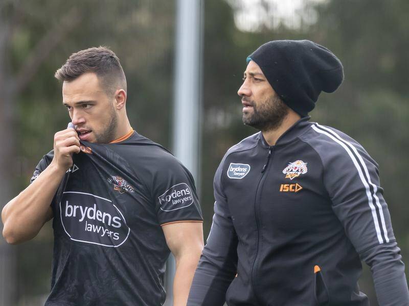 Luke Brooks (left) has been axed and veteran Benji Marshall starts for the the Wests Tigers .