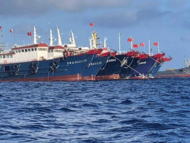 Manila has objected to Chinese ships moored at Whitsun Reef in the South China Sea.