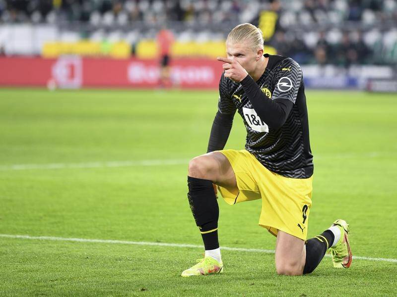 Borussia Dortmund's Erling Haaland celebrates after scoring in their Bundesliga win at Wolfsburg.