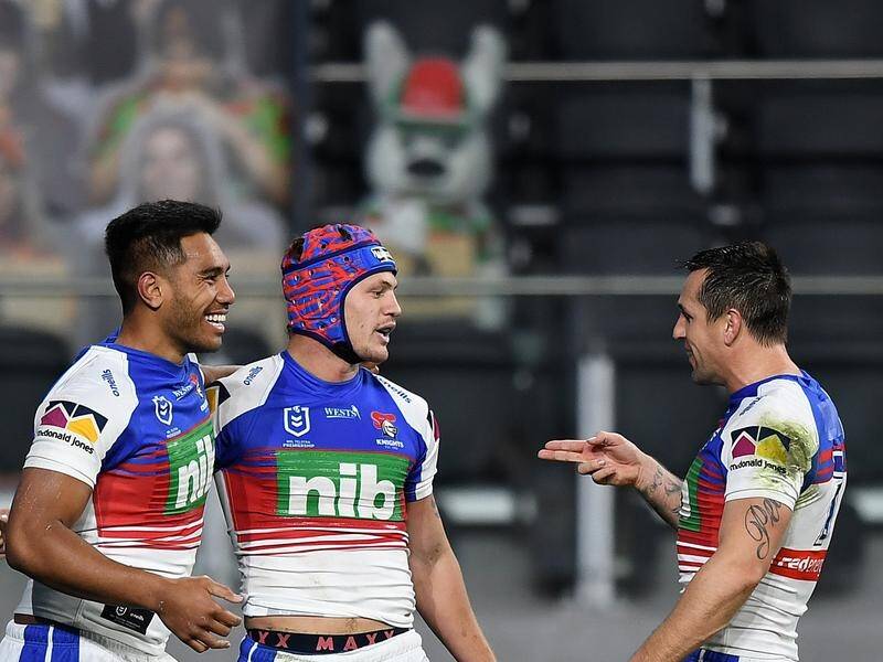 Kalyn Ponga (c) and Mitchell Pearce (r) make a welcome return to Newcastle's team this weekend.