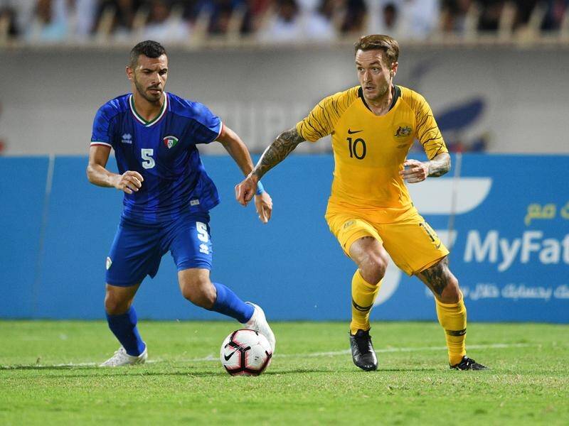 Australia's Adam Taggart (r) is eyeing more goals for his country in the qualifier against Jordan.