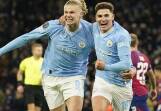 Erling Haaland (L) and Julian Alvarez (R) both scored in Manchester City's 3-2 win over RB Leipzig. (AP PHOTO)