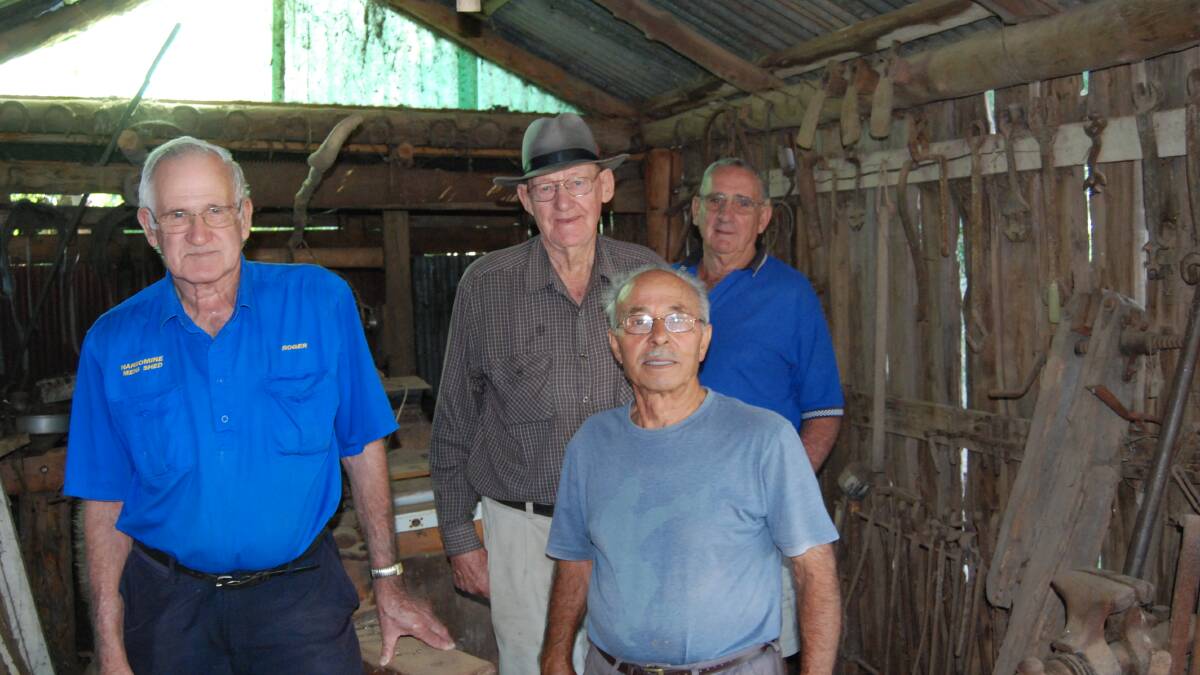 Roger Blackman, Allan Gainsford, Keith Ellrington and Teno Laversa check out the Blacksmith's Shed